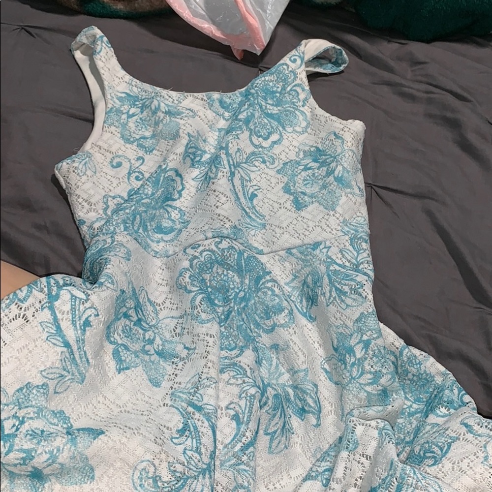 White dress with blue flowers